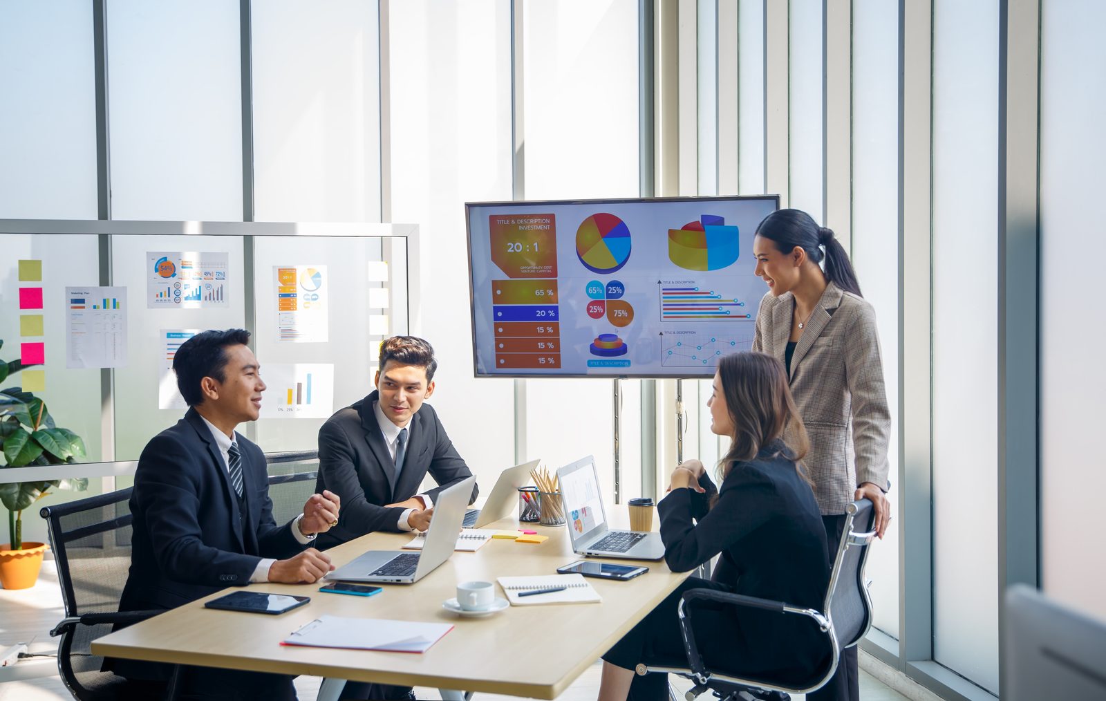 A team collaborating in a bright meeting room